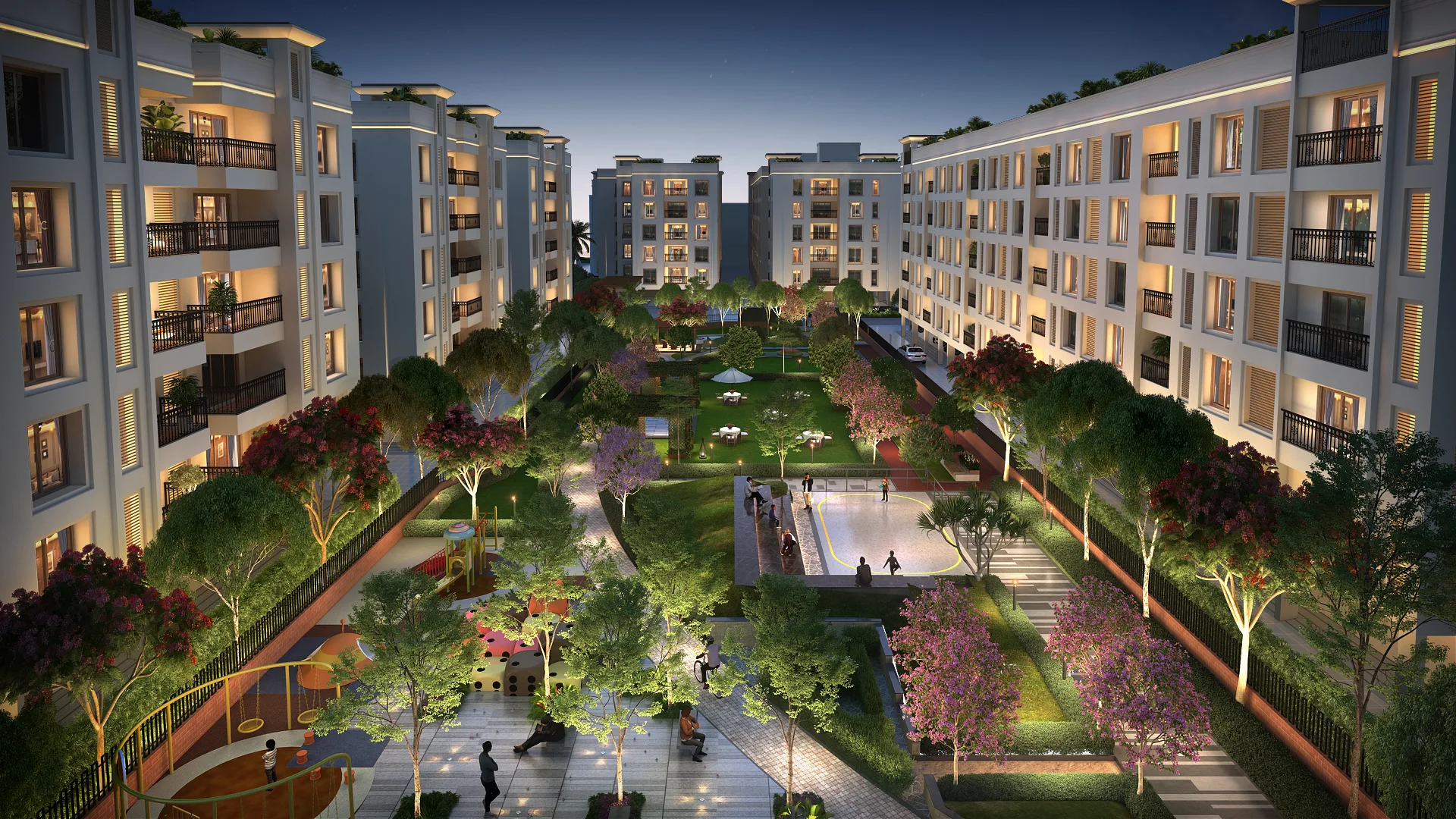 Night view of landscaped open space between porur flats and apartments with lights and amenities