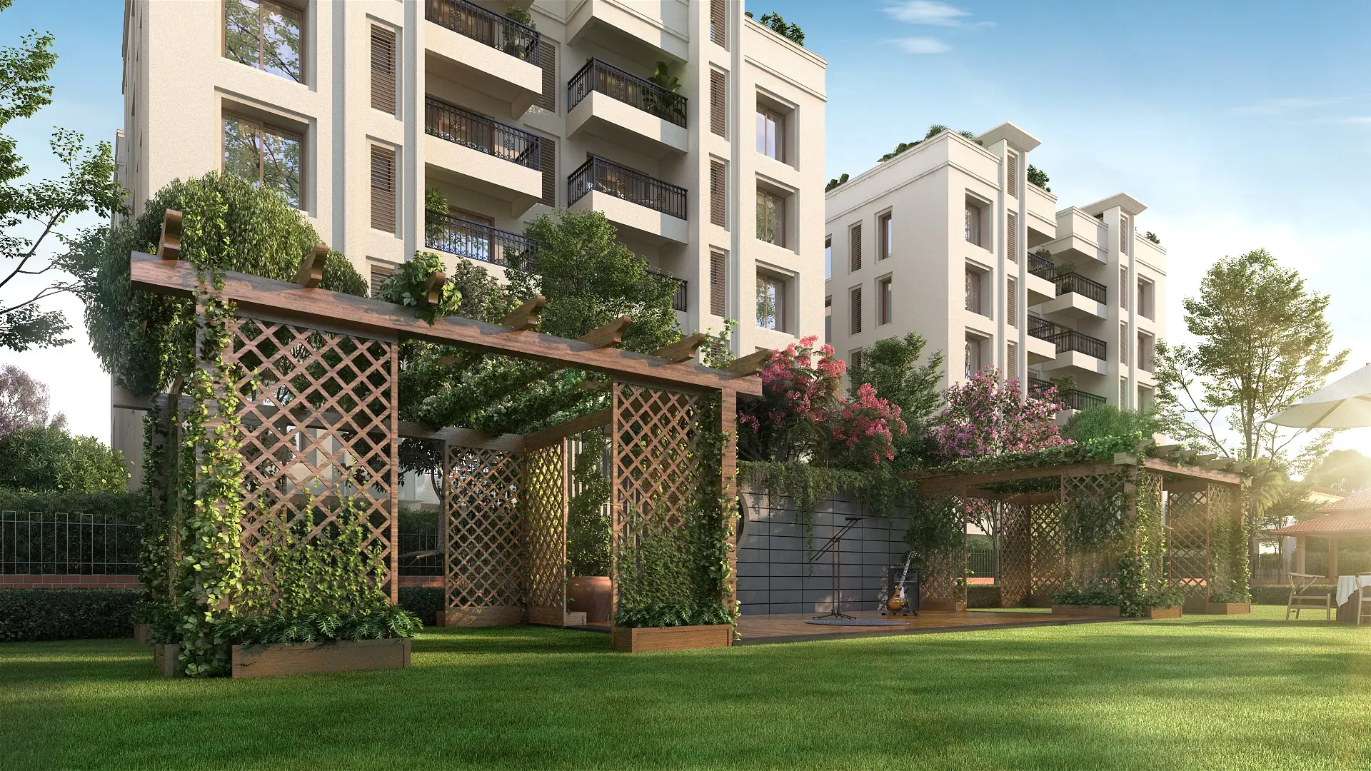 Party lawn and pergola area inside premium porur flats and apartments with lush landscaped garden