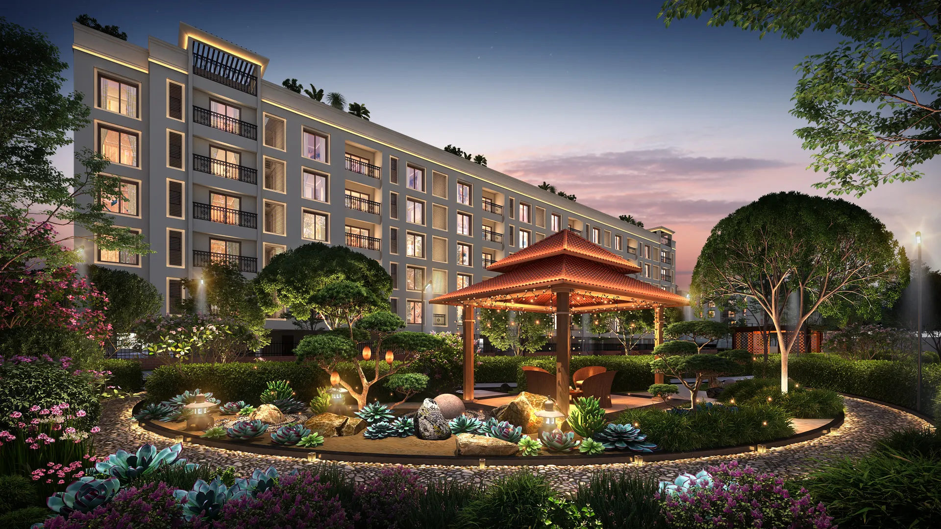 Dusk view of beautifully lit zen garden between porur flats and apartments with landscaped pathways.